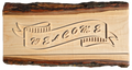 JB - signs - Welcome in raised letters in live edge wood