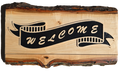 JB - signs - Welcome in black in live edge wood